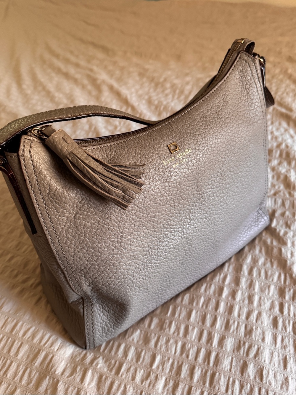 Kate Spade Greige Pebbled Leather Tassel Shoulder Bag - Bookstripe Lining